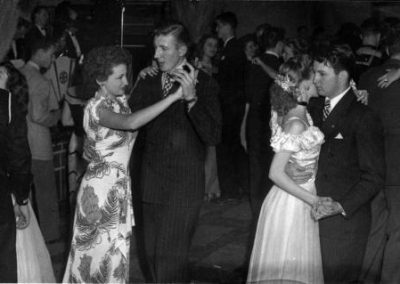 Taken at the same 1946 dance, this photograph shows three FJC students in their naval uniforms. Several months after the war, veterans continued to wear their military uniforms at events and class sessions.
